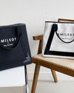 활용도 만점 캔버스 토드 크로스백